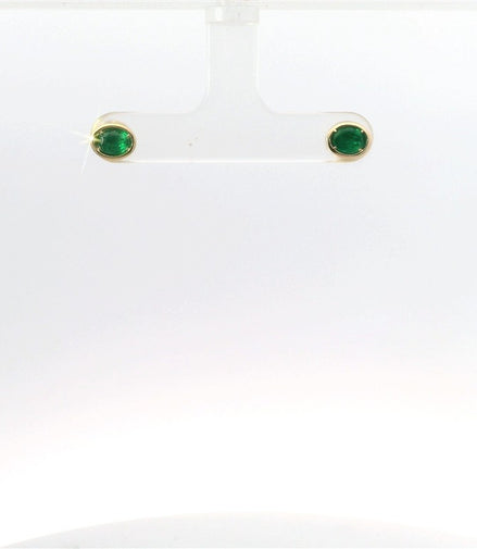 14K Yellow Gold Emerald Bezel Set East/West Oval Shaped Stud Earrings