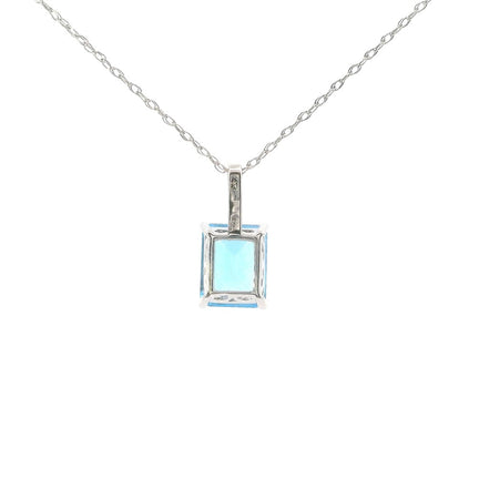 14K White Gold Diamond And Blue Topaz Emerald Cut Pendant Necklace