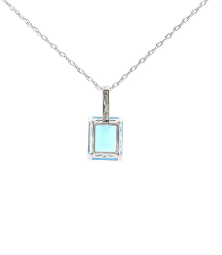 14K White Gold Diamond And Blue Topaz Emerald Cut Pendant Necklace