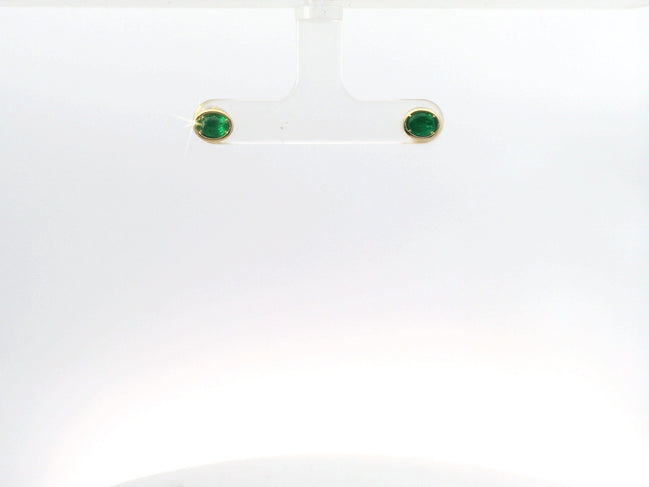 14K Yellow Gold Emerald Bezel Set East/West Oval Shaped Stud Earrings