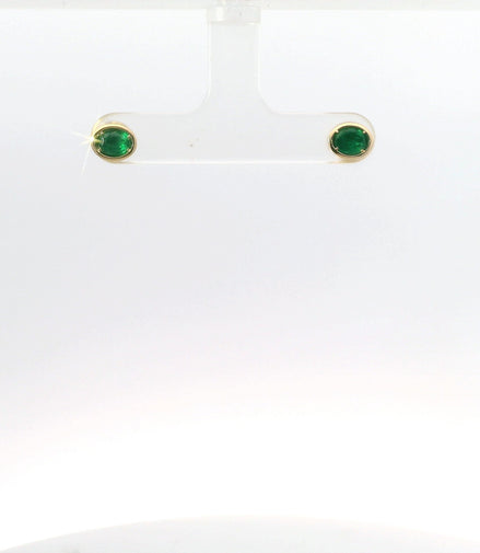 14K Yellow Gold Emerald Bezel Set East/West Oval Shaped Stud Earrings