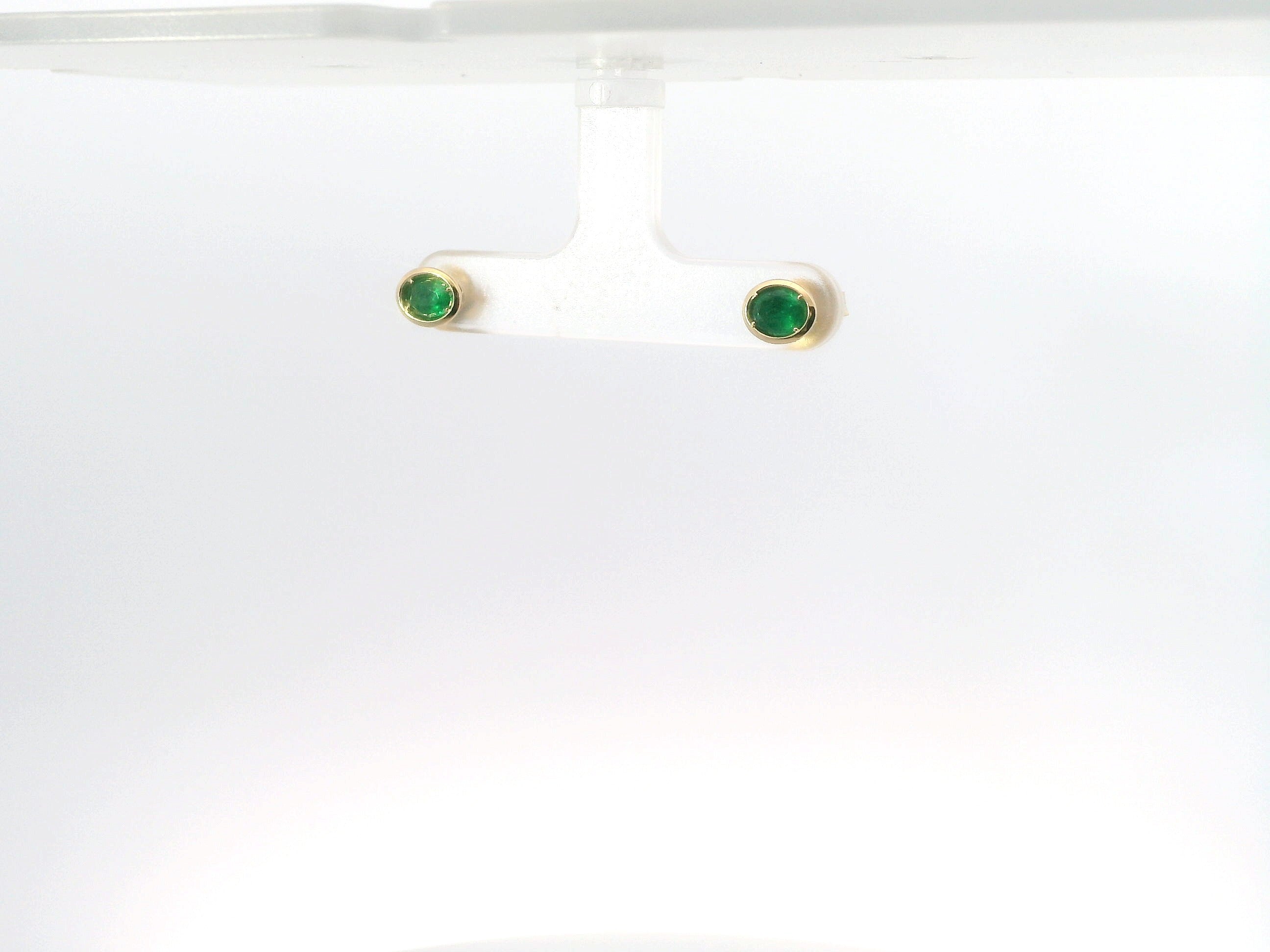 14K Yellow Gold Emerald Bezel Set East/West Oval Shaped Stud Earrings