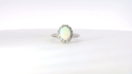 14K White Gold Oval Cut Opal And Diamond Fashion Ring