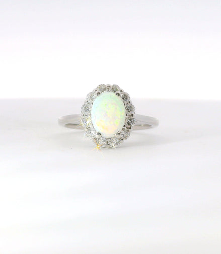 14K White Gold Oval Cut Opal And Diamond Fashion Ring